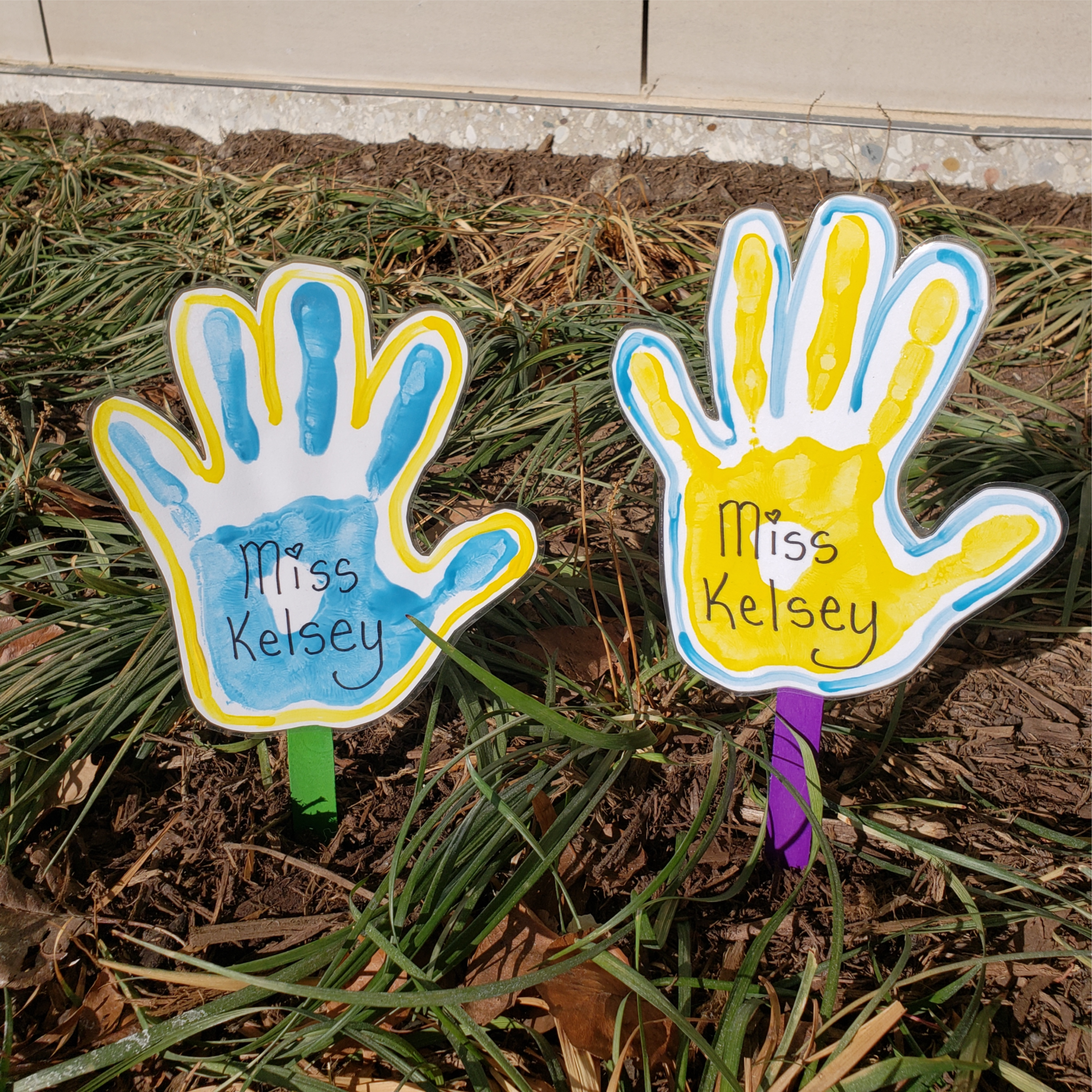 Handprint flowers outside the library