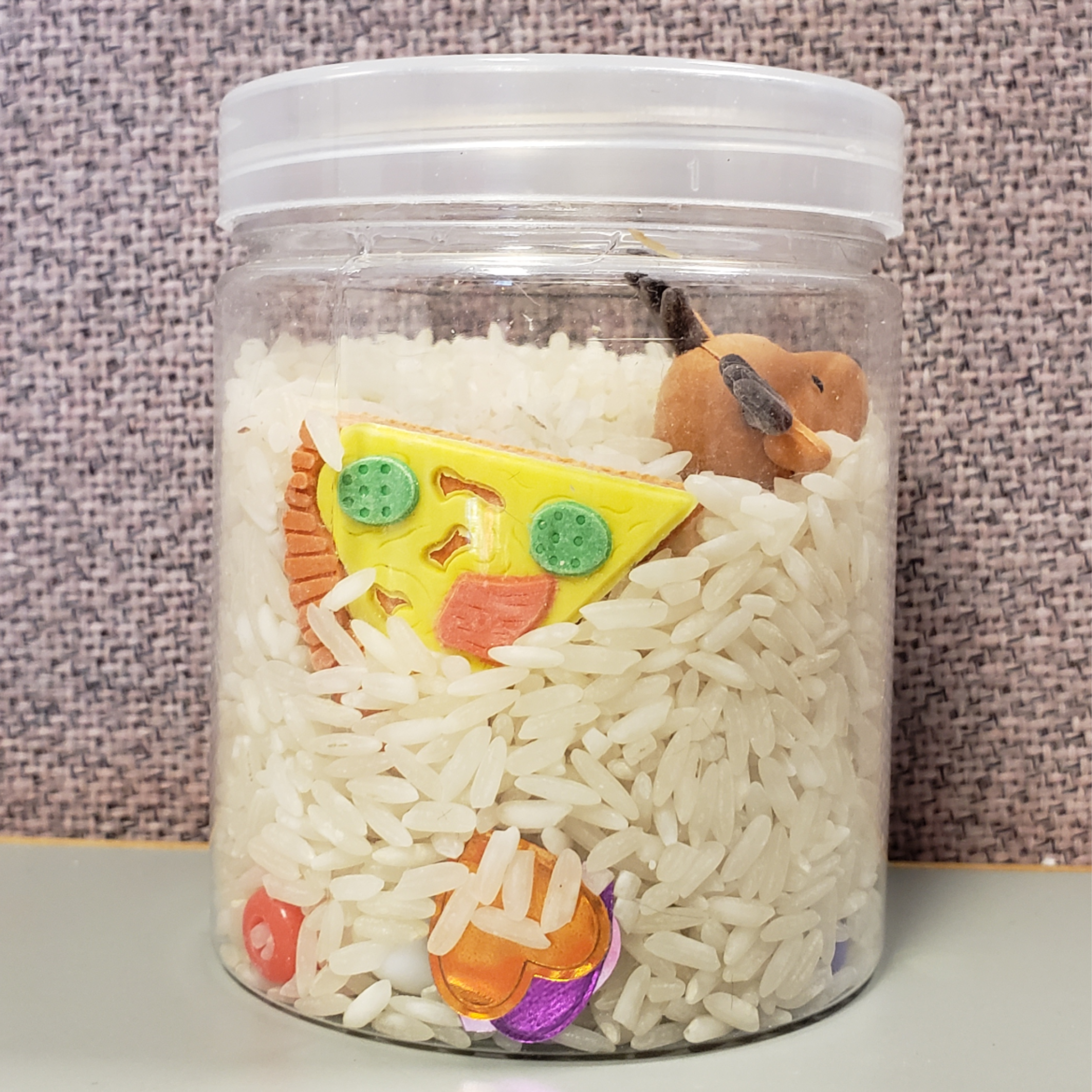 I-Spy shaker: See-through jar with rice and small objects 