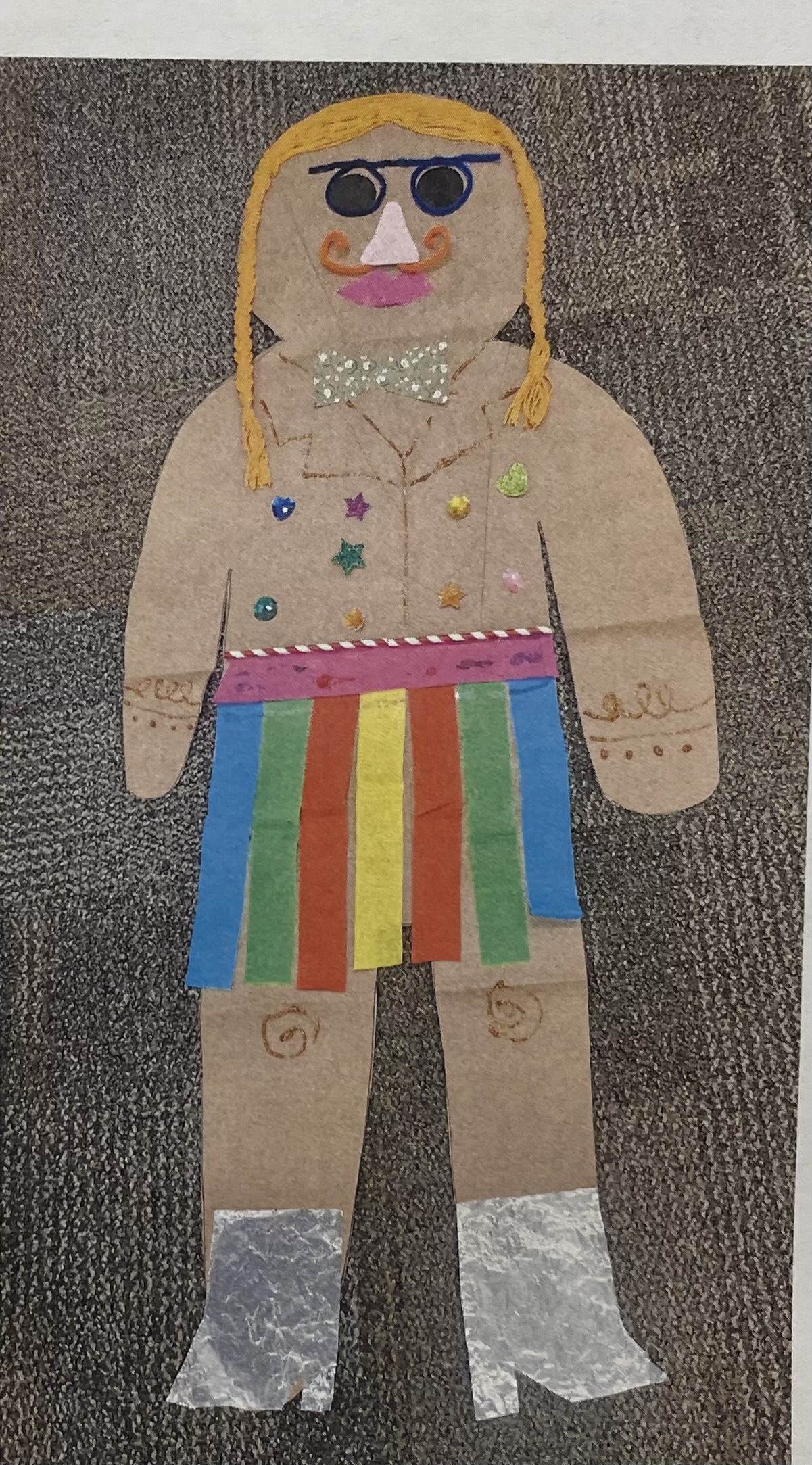 large paper gingerbread girl with rainbow skirt