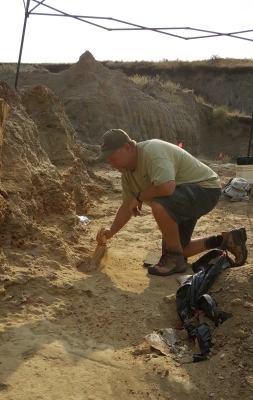 Paleontologist at a desert dig
