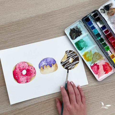 hand painting watercolor donuts and watercolor palette