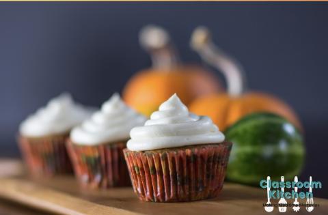 pumpkin cupcakes with frosting