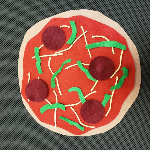 Felt pizza has multiple felt toppings
