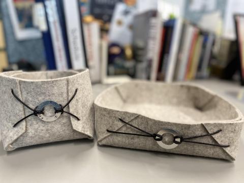 two felt boxes with embellishments