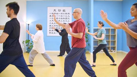 Group of people in a tai chi class