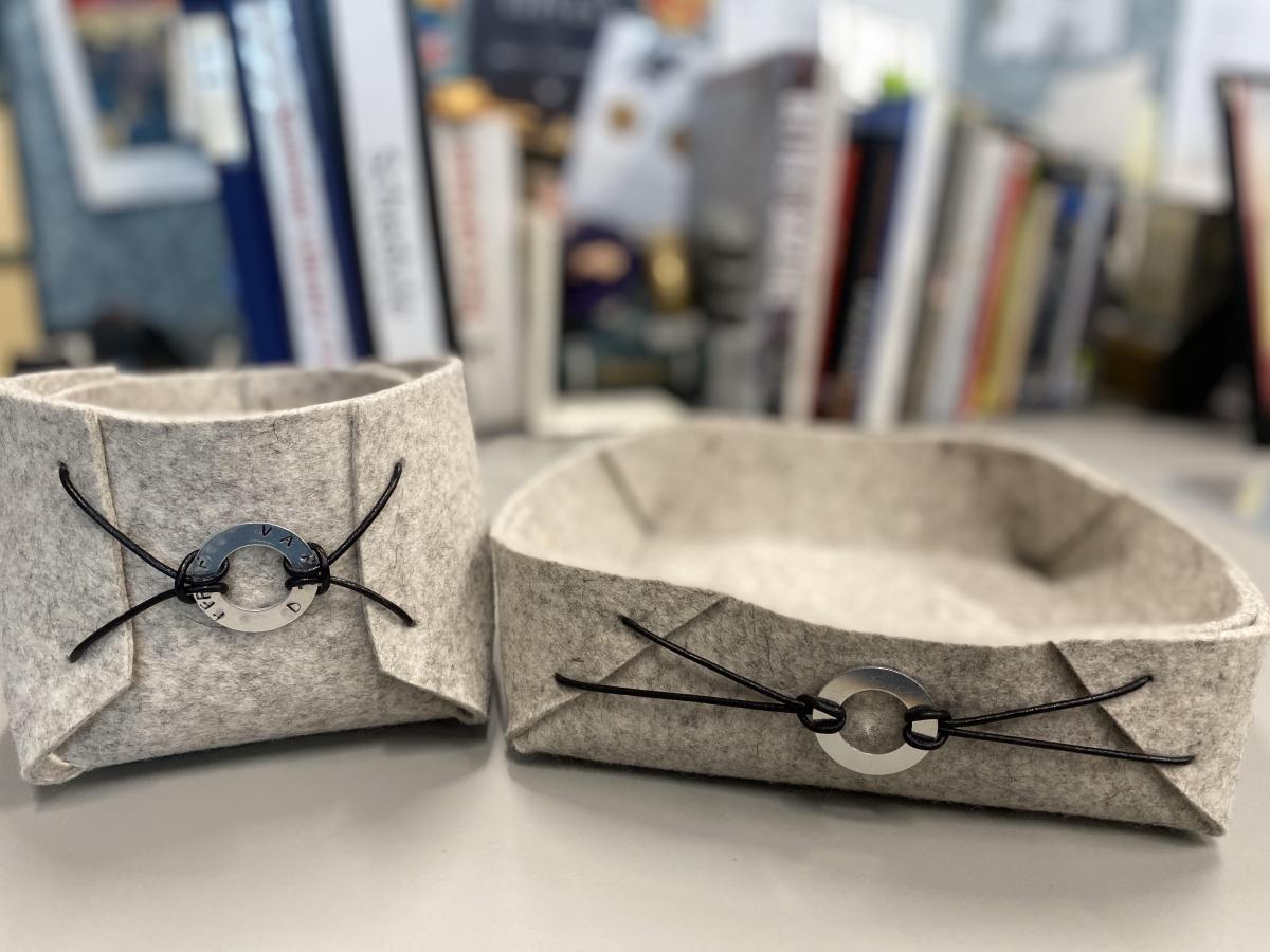 two felt boxes with embellishments