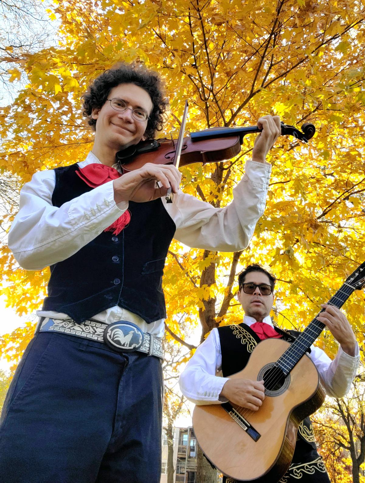 A violin and guitar player 